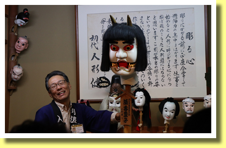 showing how to manipulate puppets, Awa Deko Nongyo Kaikan, Tokushima City, Shikoku